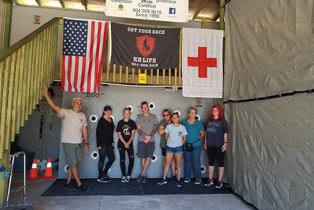 Got Your Back K9 Life trainers and students posing together after a training event